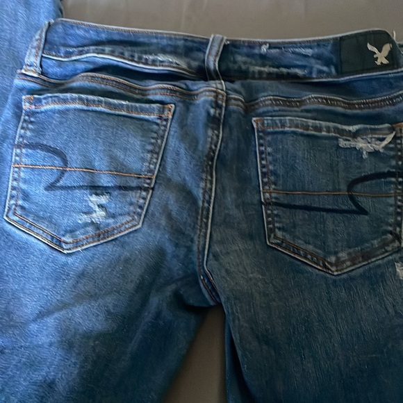 American Eagle Super Stretch Super Low Jegging Distressed Raw Hem US 4 - Picture 7 of 7